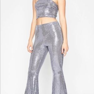 Sequin bell bottom pants. NWOT.